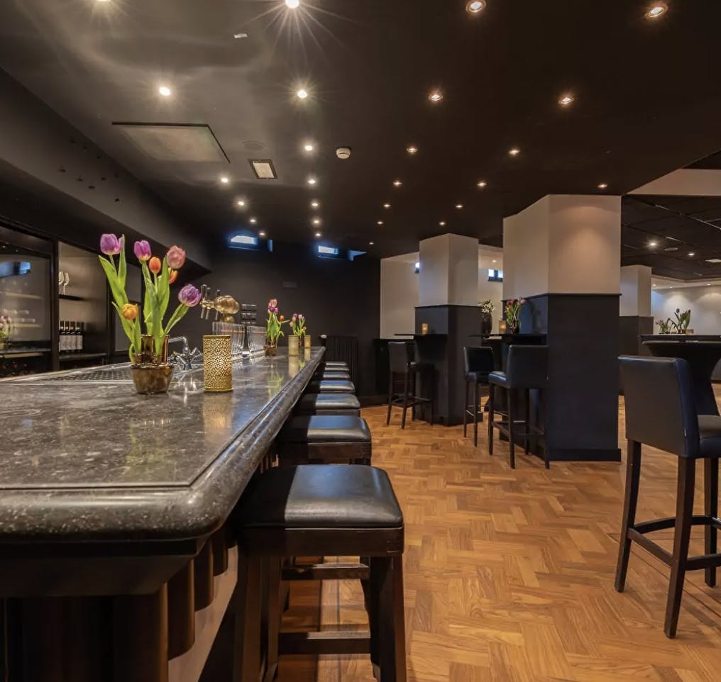 Sleek event space at Ray's Club, ideal for networking and cocktail receptions.