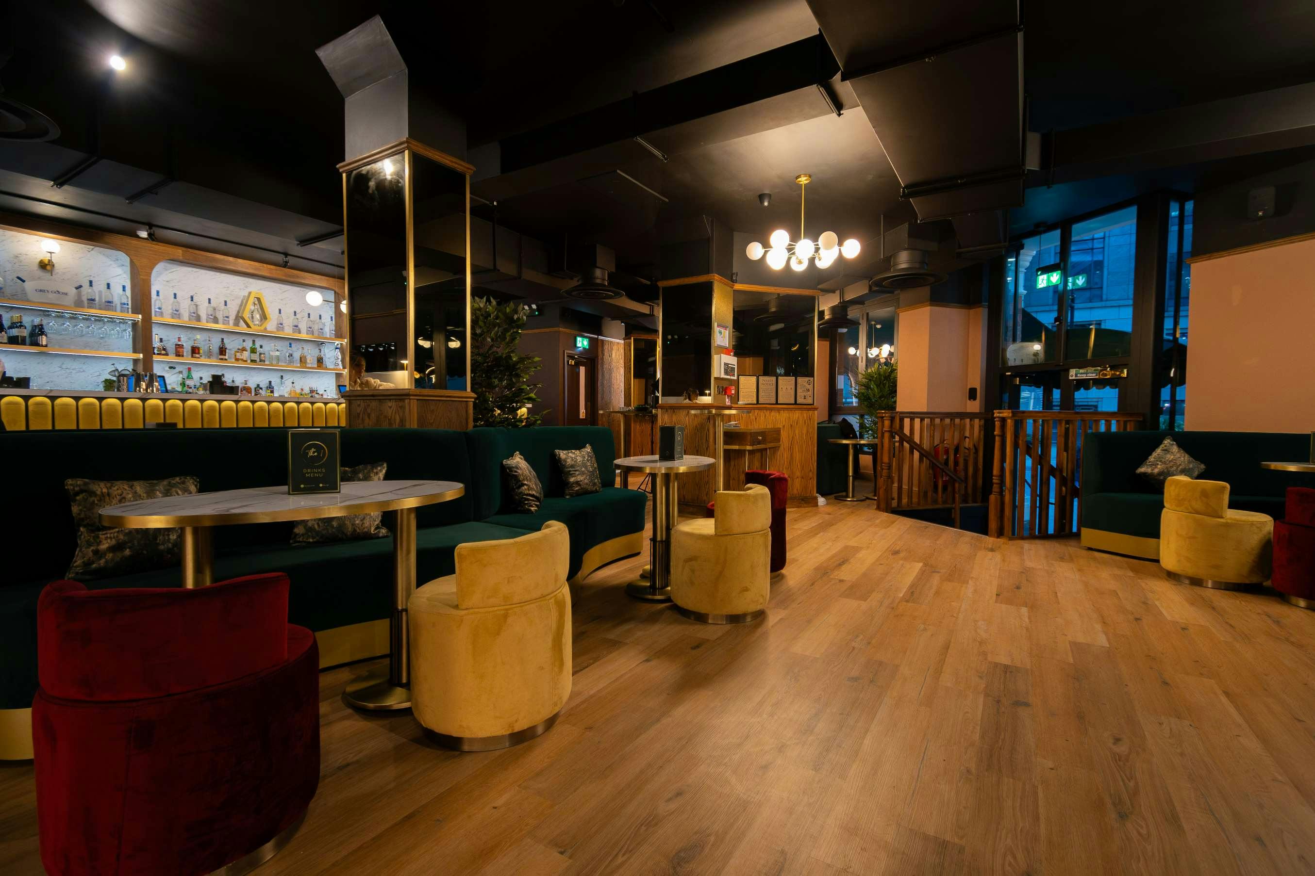 Stylish venue with plush seating for intimate meetings and events at The 1 Bar.