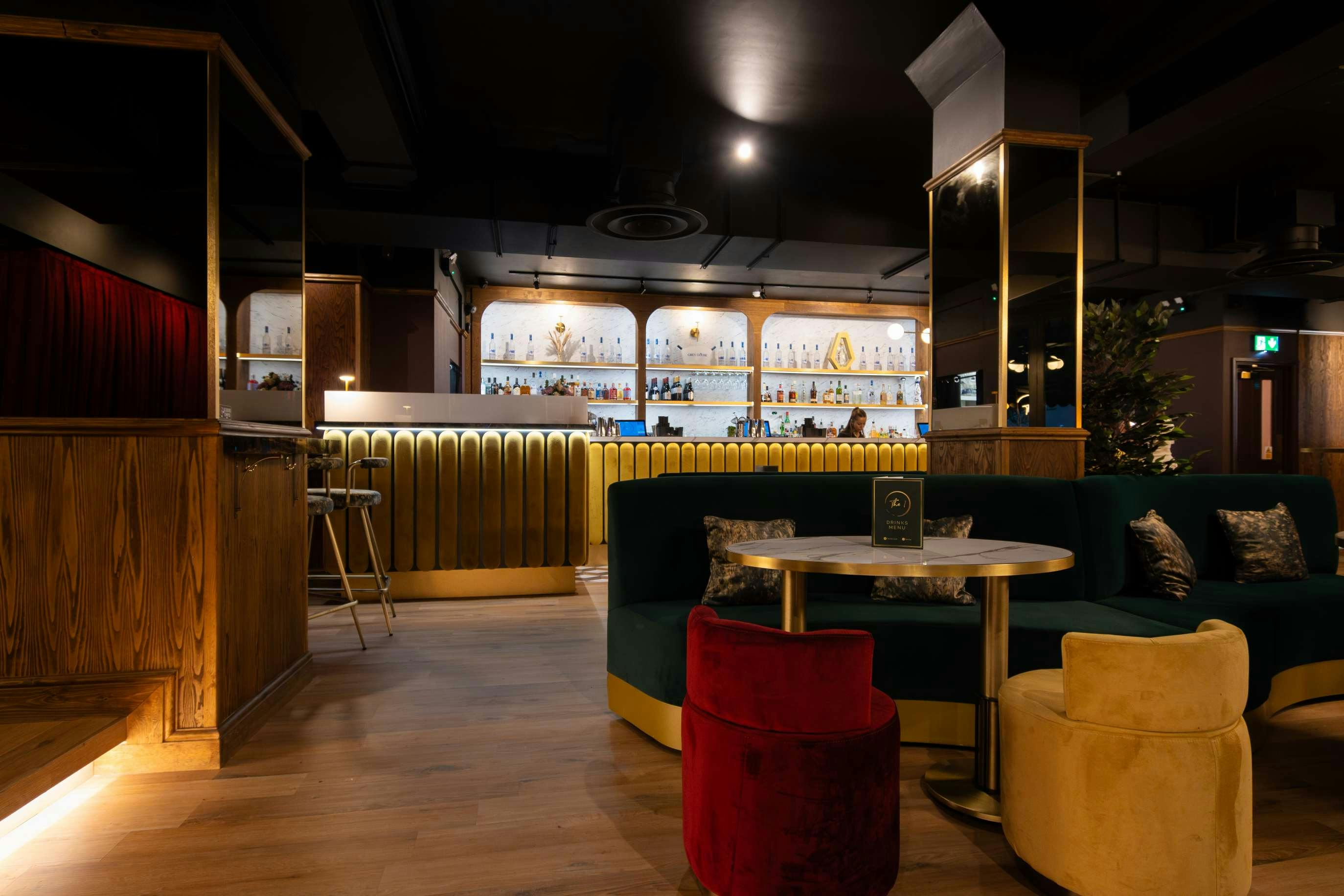 Stylish venue with plush seating for intimate gatherings and networking events.