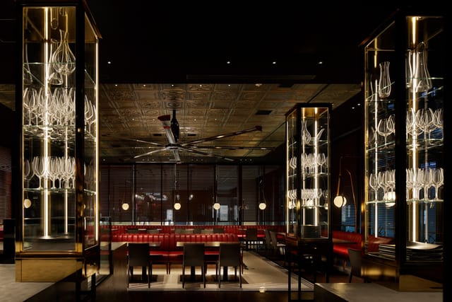 Sophisticated dining space with elegant glass displays for upscale events in Nihombashi.