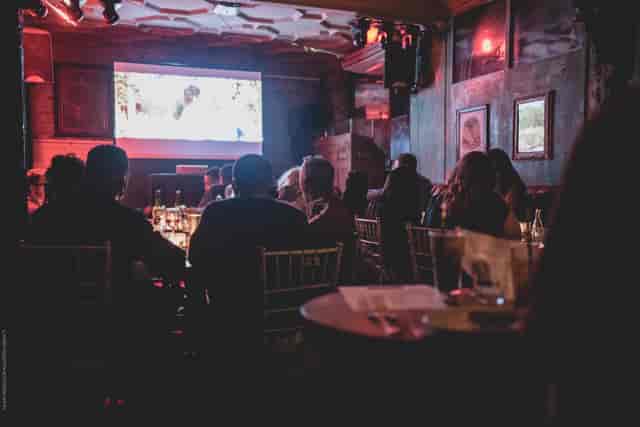 Music Club Room in Paradise: intimate, dimly lit private event space for screenings and networking.