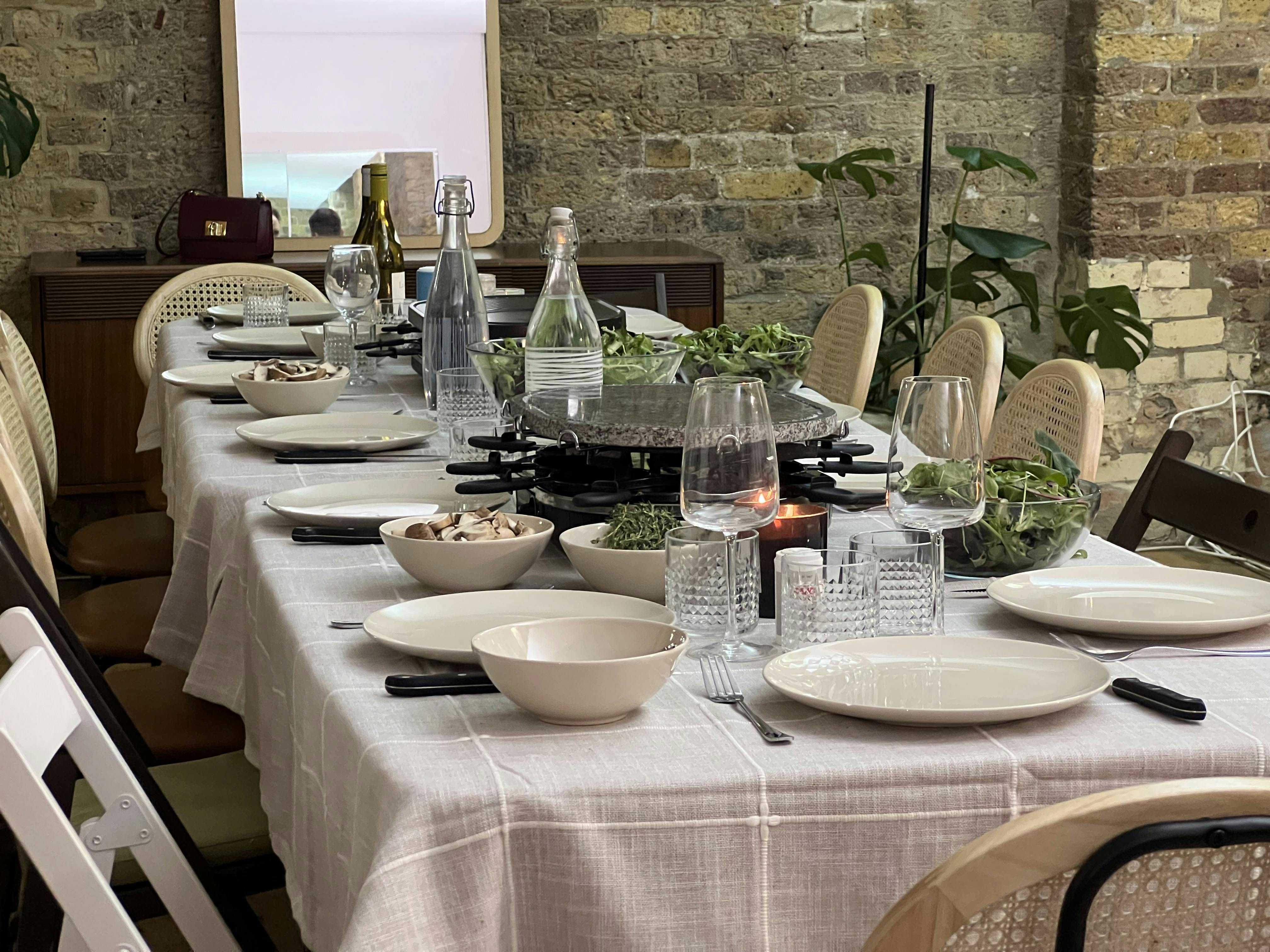 Dinner setup in The Artist's Loft, Shoreditch; ideal for networking events and team-building.