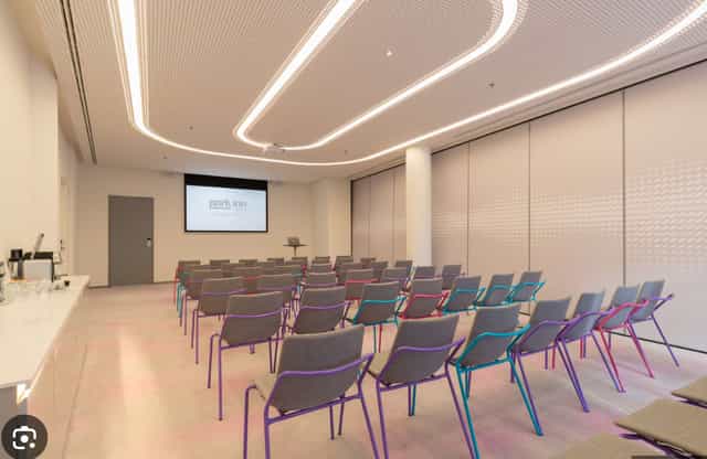 Modern meeting room with stylish chairs for workshops at Park Inn Amsterdam.