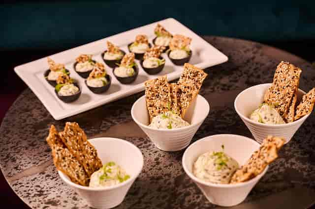Elegant hors d'oeuvres at The American Bar, perfect for networking and cocktail events.