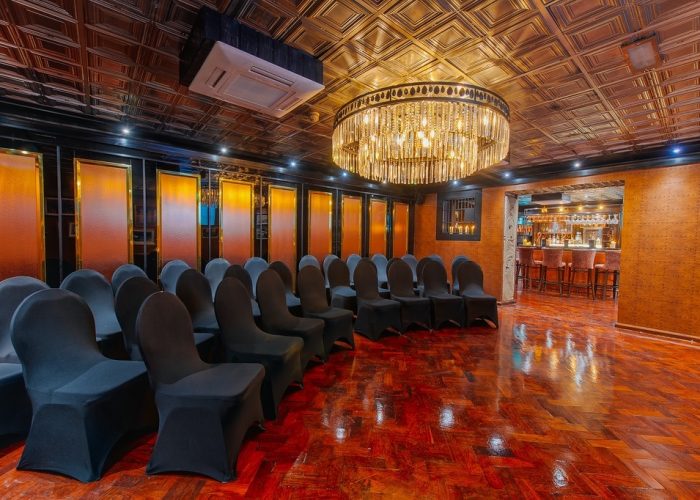 Sophisticated meeting room with elegant chairs, ideal for corporate events and workshops. - Banner