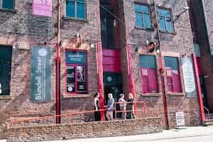 FunnyBoyz Liverpool venue with rustic brick facade, perfect for events and gatherings.