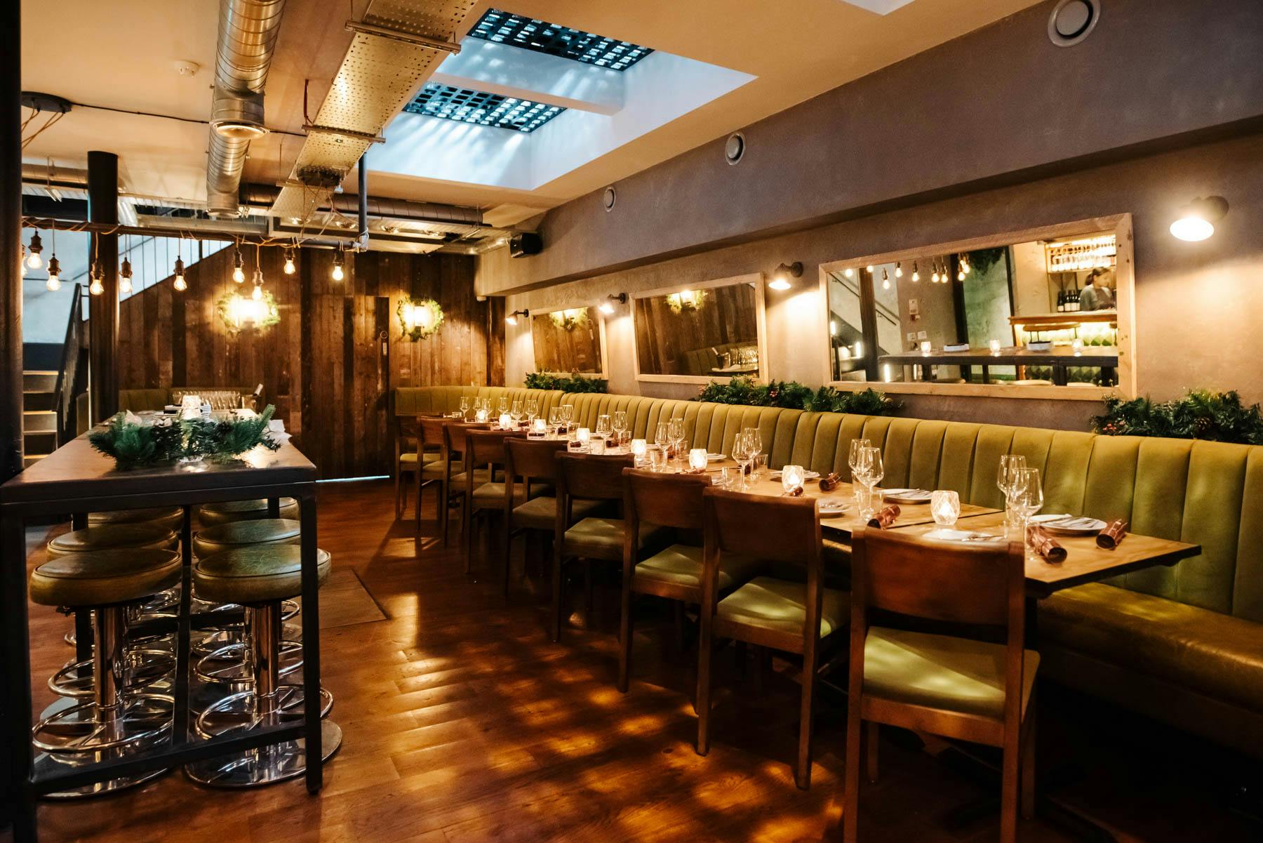 Stylish event space in Salt Yard Borough Market with elegant table and warm lighting.