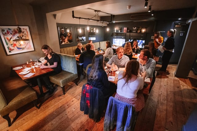 Vibrant dining space in The Charcol Room, perfect for networking and celebrations.