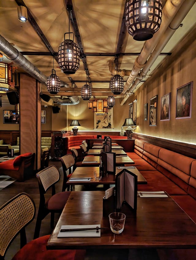 Stylish venue with warm lighting for intimate meetings and events at The Gallery, Lucy Wong.