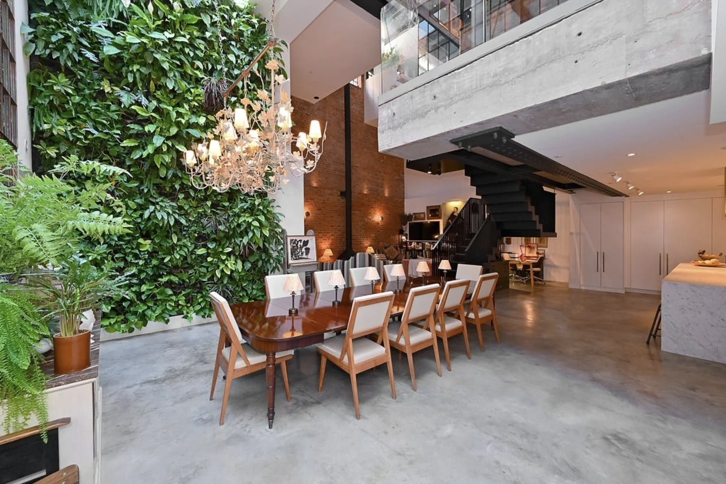 1900s Brewery Cooperage Loft with chandelier, ideal for events and gatherings.