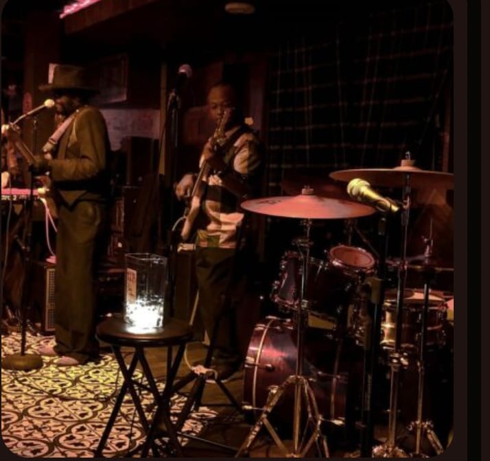 "Prohibition Lounge Bar live music event with warm lighting and vibrant atmosphere."