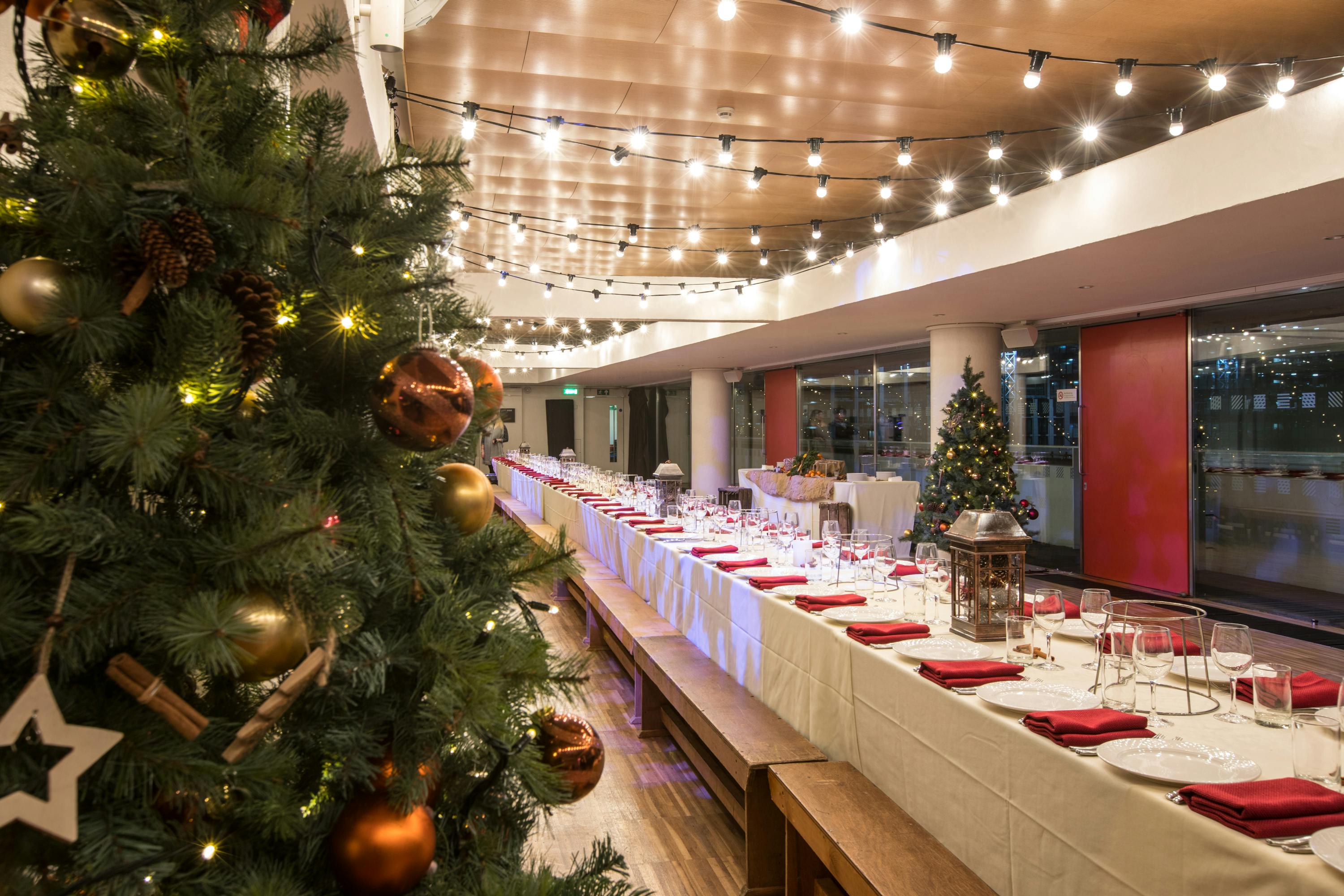 Festive dining setup with elegant decor for corporate holiday parties in Southbank Centre.