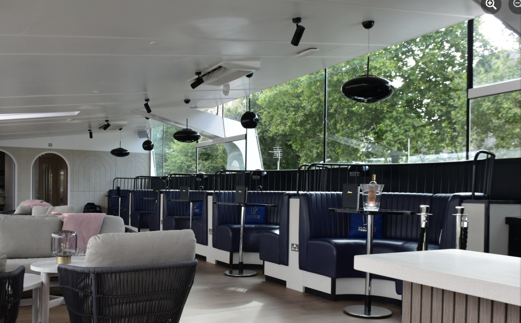 Modern Clipper Lounge EMB with sleek seating, ideal for networking events and meetings. - Banner