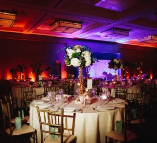 Elegant banquet hall with floral centerpieces for upscale weddings and corporate events.