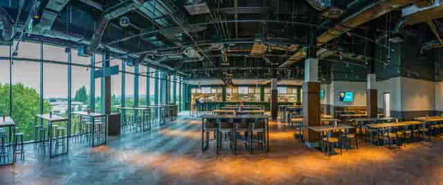 Modern Clubhouse Bar & Kitchen at Allianz Stadium, ideal for events with natural light.