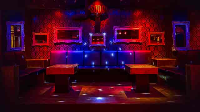 Vibrant Club Soda 23 lounge with plush seating, ideal for events and parties.