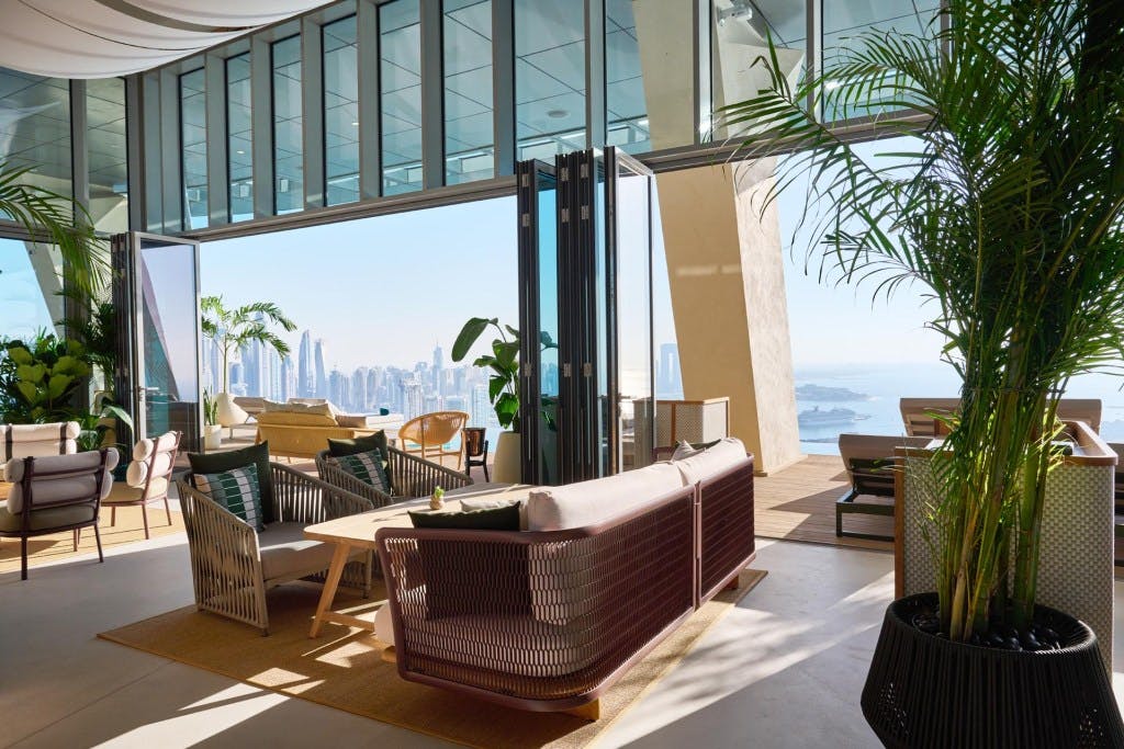 Stylish indoor lounge with skyline views, perfect for networking events and meetings.