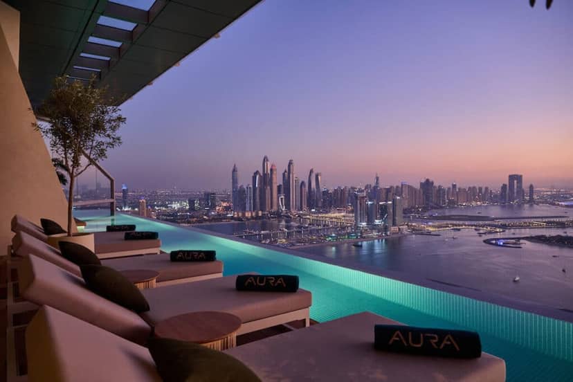Wellness in the Sky at AURA SkyPool with infinity pool and city skyline, perfect for events.