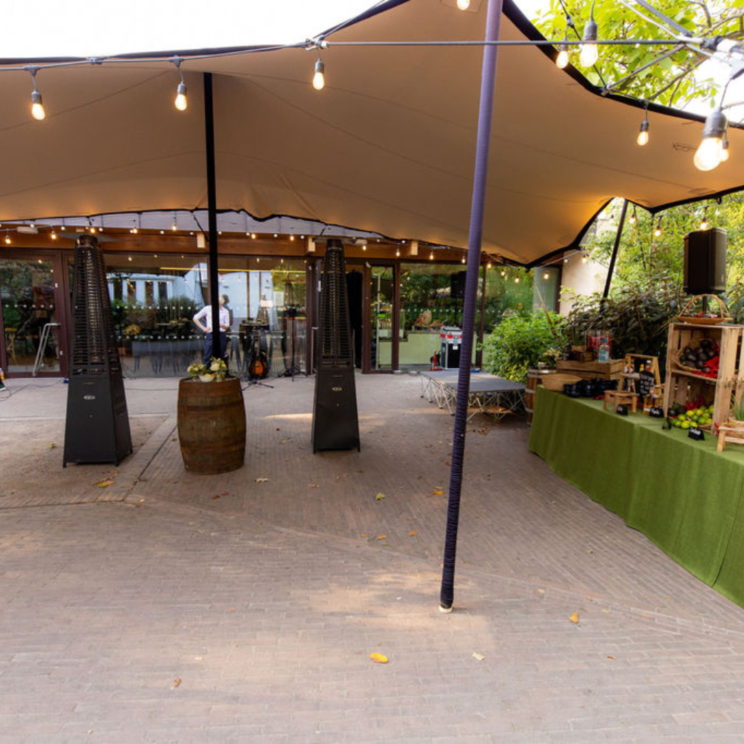 Outdoor event space in Sands End with sound equipment for corporate gatherings and social events. - Banner
