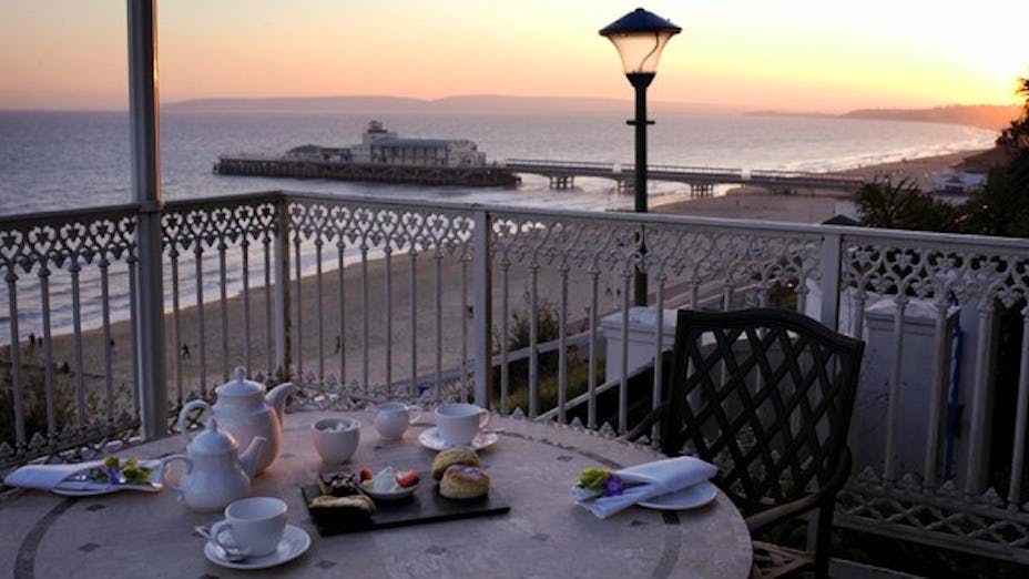 Seaside terrace at Oscar's Restaurant, elegant table setting for events in Bournemouth.