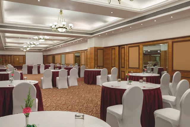 Elegant event space at Ramada Plaza, Juhu Beach for corporate meetings or social gatherings.