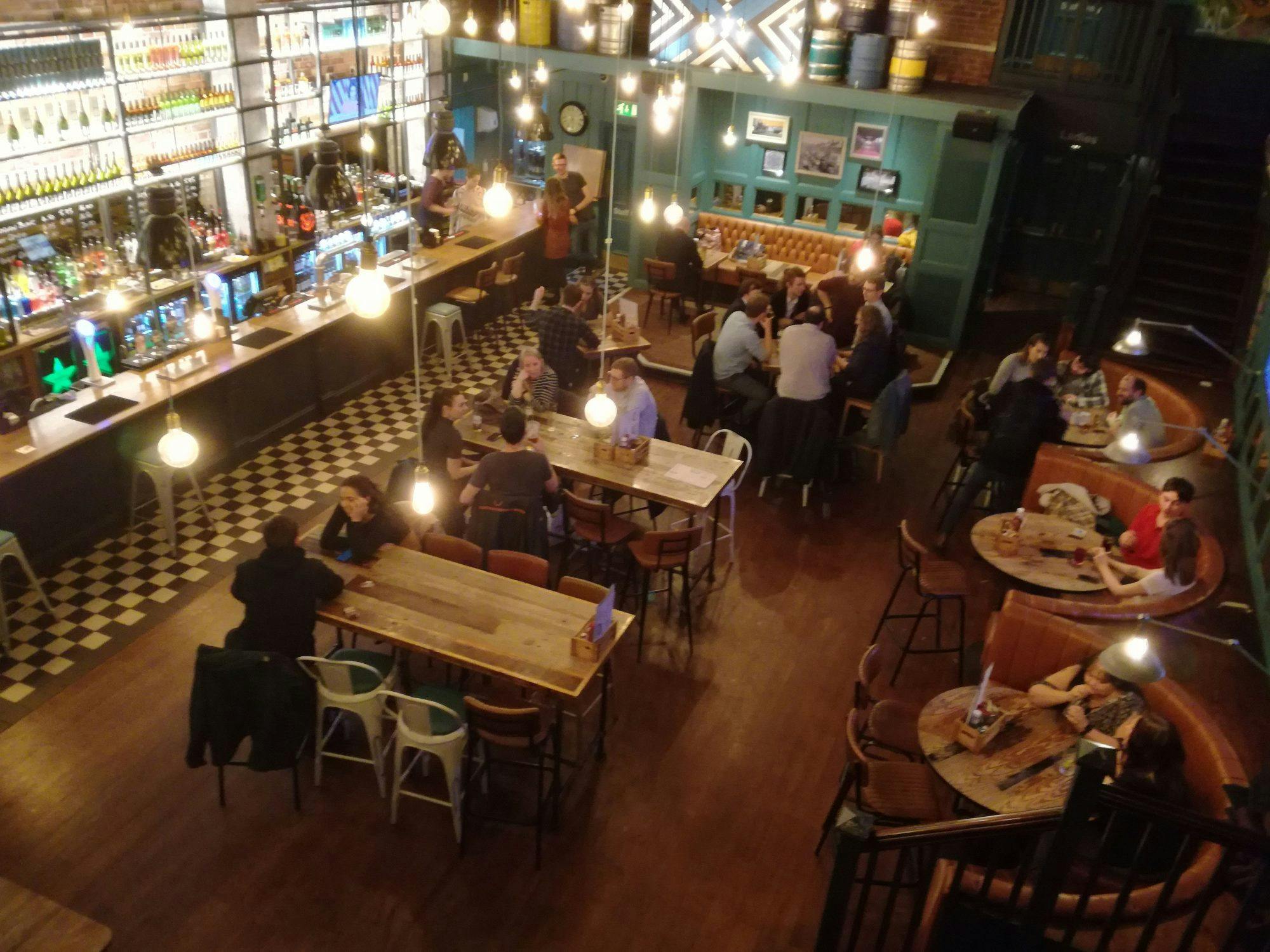 Vibrant venue with warm lighting, perfect for casual gatherings and formal events.