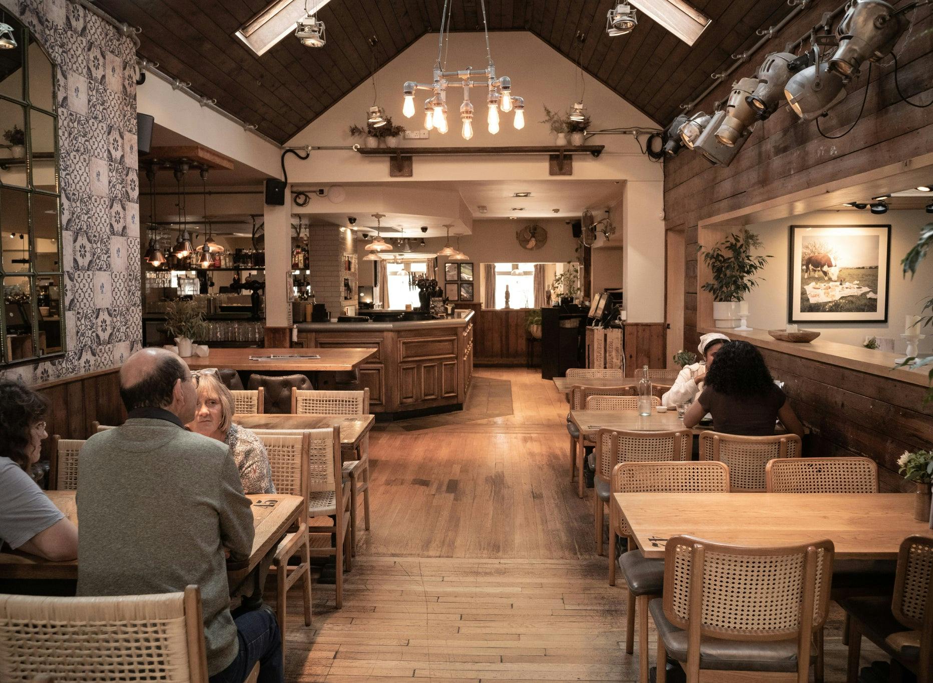 Cozy bar in The Plough Harborne, ideal for intimate meetings and small events.