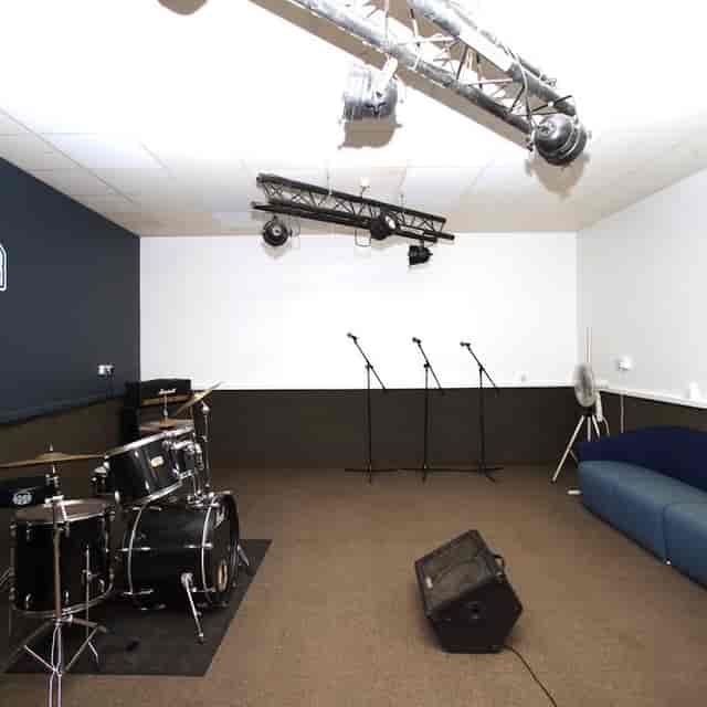 Rehearsal Studio in The Mushrooms with stage, ideal for live performances and workshops.
