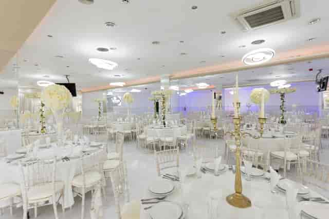 Elegant Mayfair Suite with white decor, ideal for weddings and corporate events.