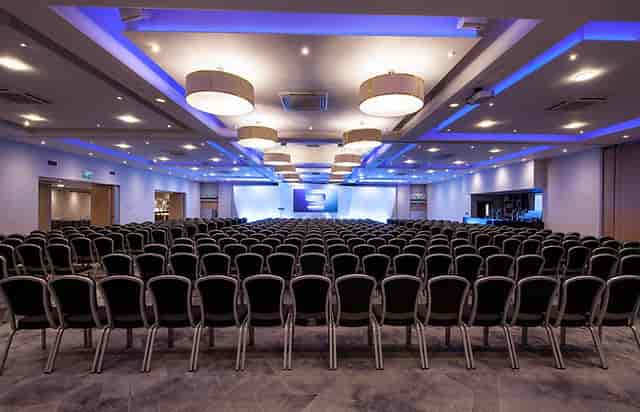 Spacious conference room with chairs for events and seminars at B5 Central.
