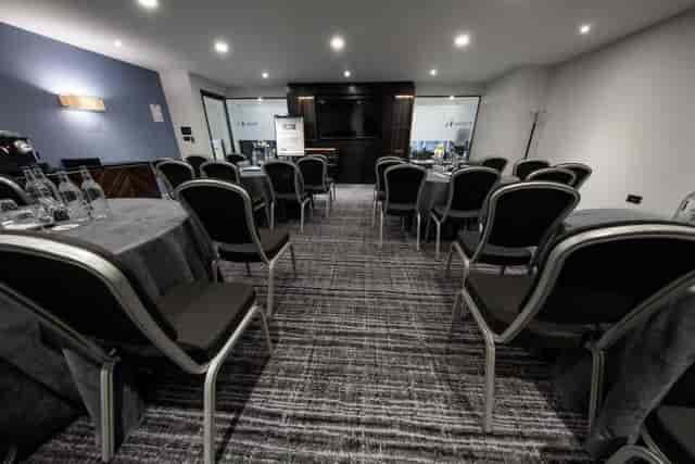 Speedwell Room: modern meeting space for corporate events with collaborative seating.