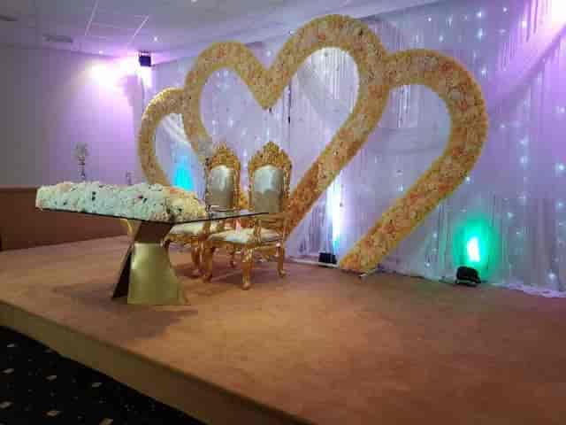 ICB-Balcony Suite with heart floral backdrop, ideal for weddings and celebrations.