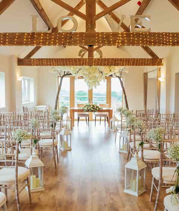 Luxury Glazed Garden Marquee with floral decor for romantic Bordesley Park weddings.