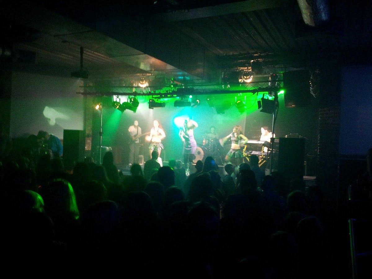 Vibrant live music venue with dynamic lighting for engaging events and performances.