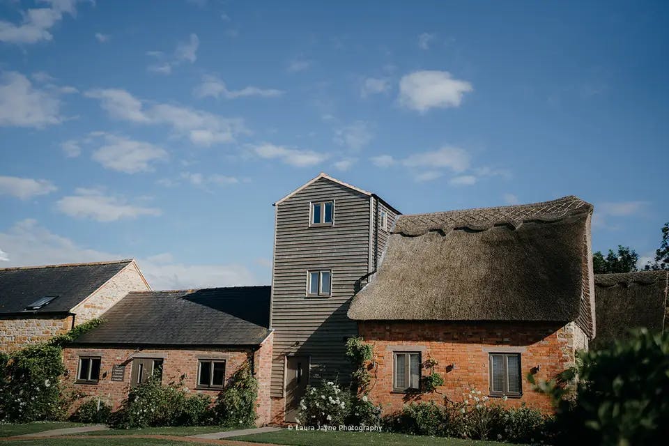 16th Century Barn at Blackwell Grange, thatched roof venue for weddings and corporate retreats.