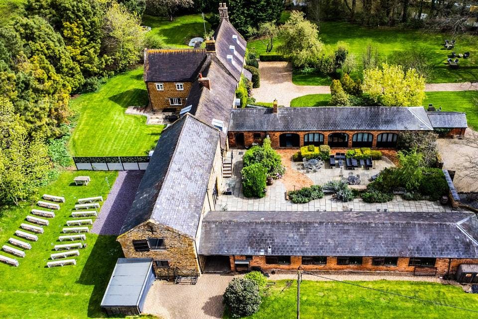 Courtyard Barn at Dodmoor House, rustic venue for outdoor weddings and events.