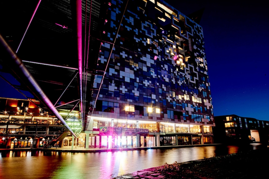 Modern Cube Hotel Birmingham at night, ideal for events and receptions by the waterfront. - Banner