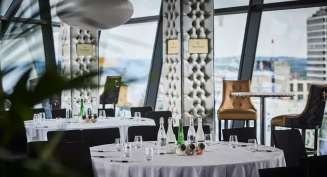 Sleek Restaurant in The Cube Hotel: elegant event space for corporate meetings and upscale gatherings.