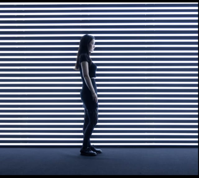Sleek Elipse venue with striped backdrop, ideal for product launches and fashion events.