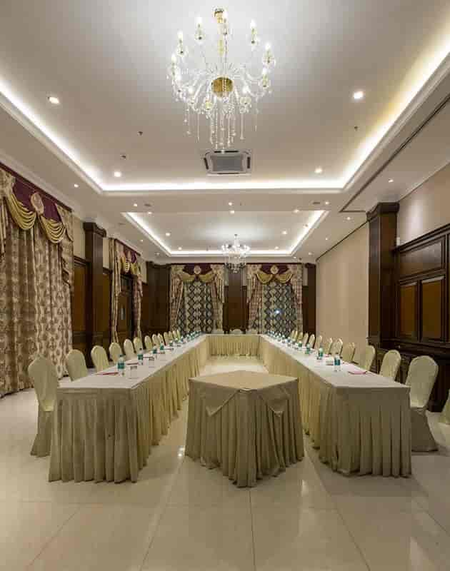 Grand Ballroom at The Grand Magrath Hotel, elegant decor for corporate meetings.