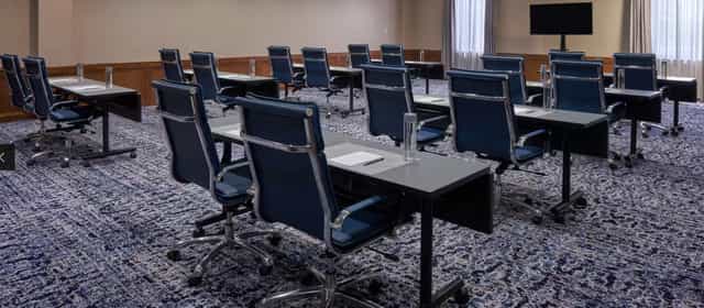 Raphael Ballroom at Hilton Houston, modern meeting room setup for corporate events.