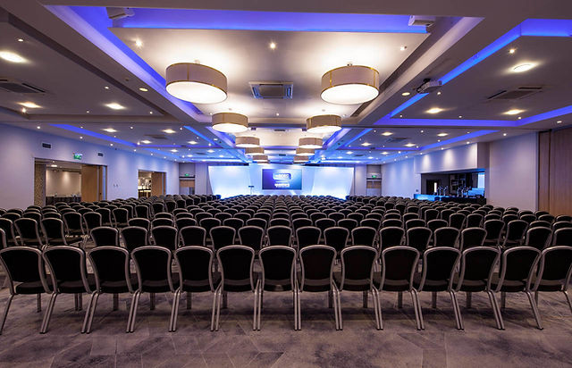 Spacious BCEC conference room with modern design, ideal for seminars and networking events. - Banner