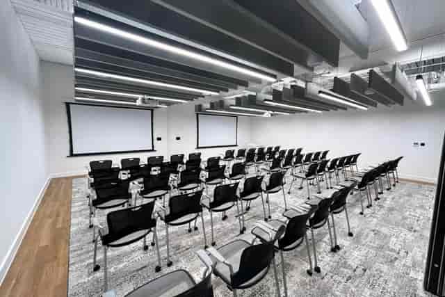 Simister Hall at Signing Tree Venue: modern meeting space for presentations and workshops.