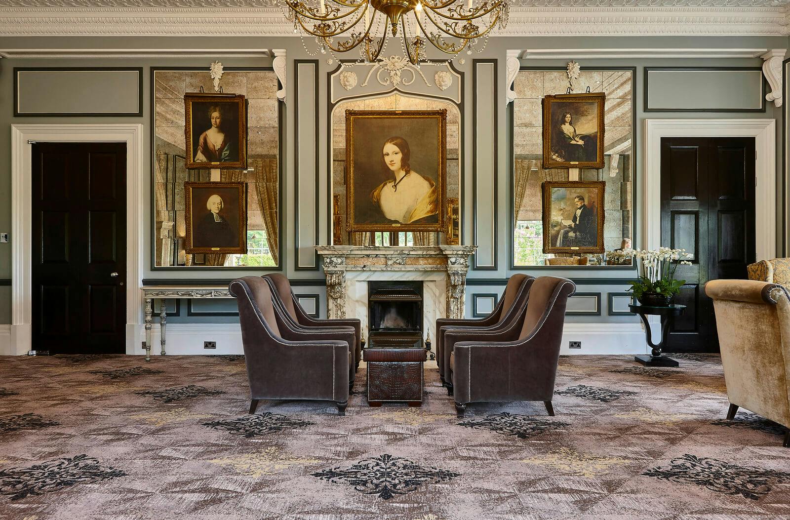 Elegant meeting space with chandeliers at Oulton Hall for corporate events.