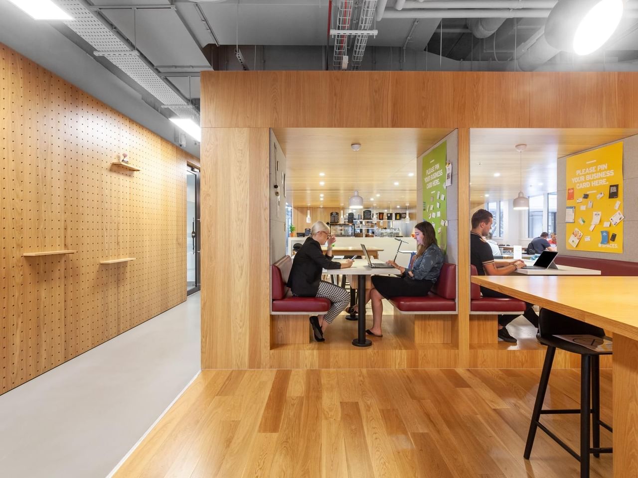 Modern cafe workspace with cozy seating for meetings and events in Lewis Building. - Banner