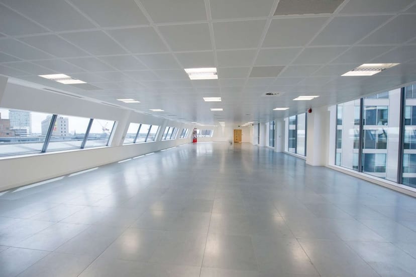 Spacious modern meeting room with large windows at 1 Victoria Square for events.
