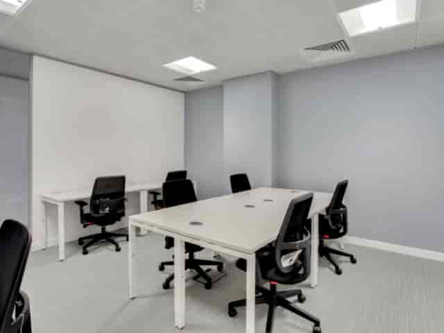 Modern minimalist meeting room in Apex House, ideal for collaborative events and presentations.