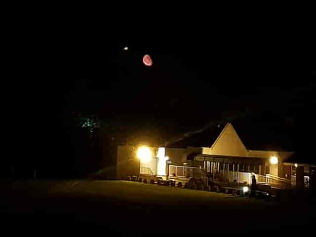 Serene conference room at night, perfect for outdoor events and gatherings.