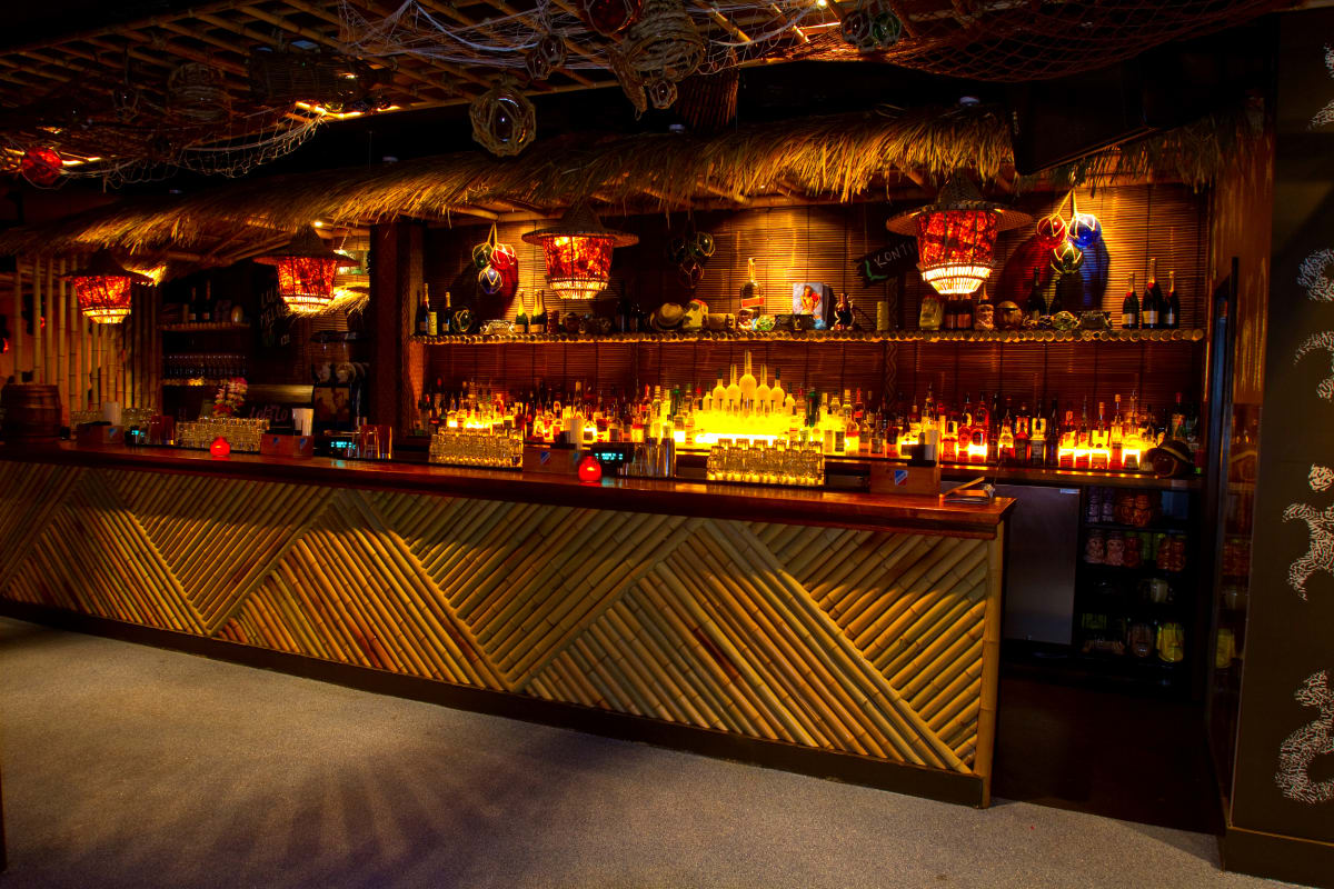 Vibrant Bamboo Bar at Lola Lo Reading, perfect for events and themed parties. - Banner
