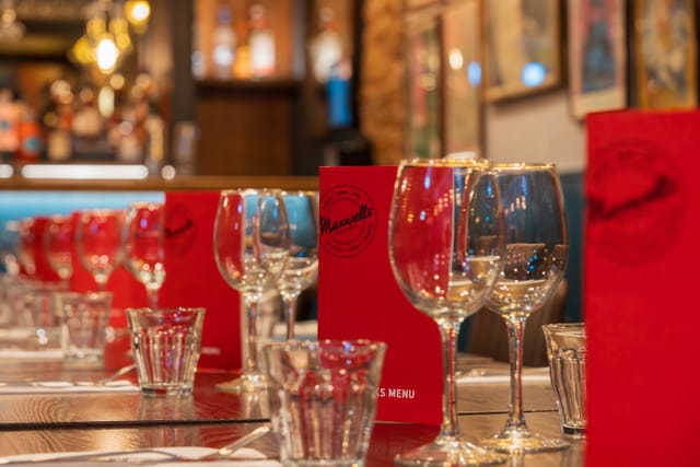 Elegant dining setup at Maxwell's Bar and Grill for corporate events and intimate gatherings.